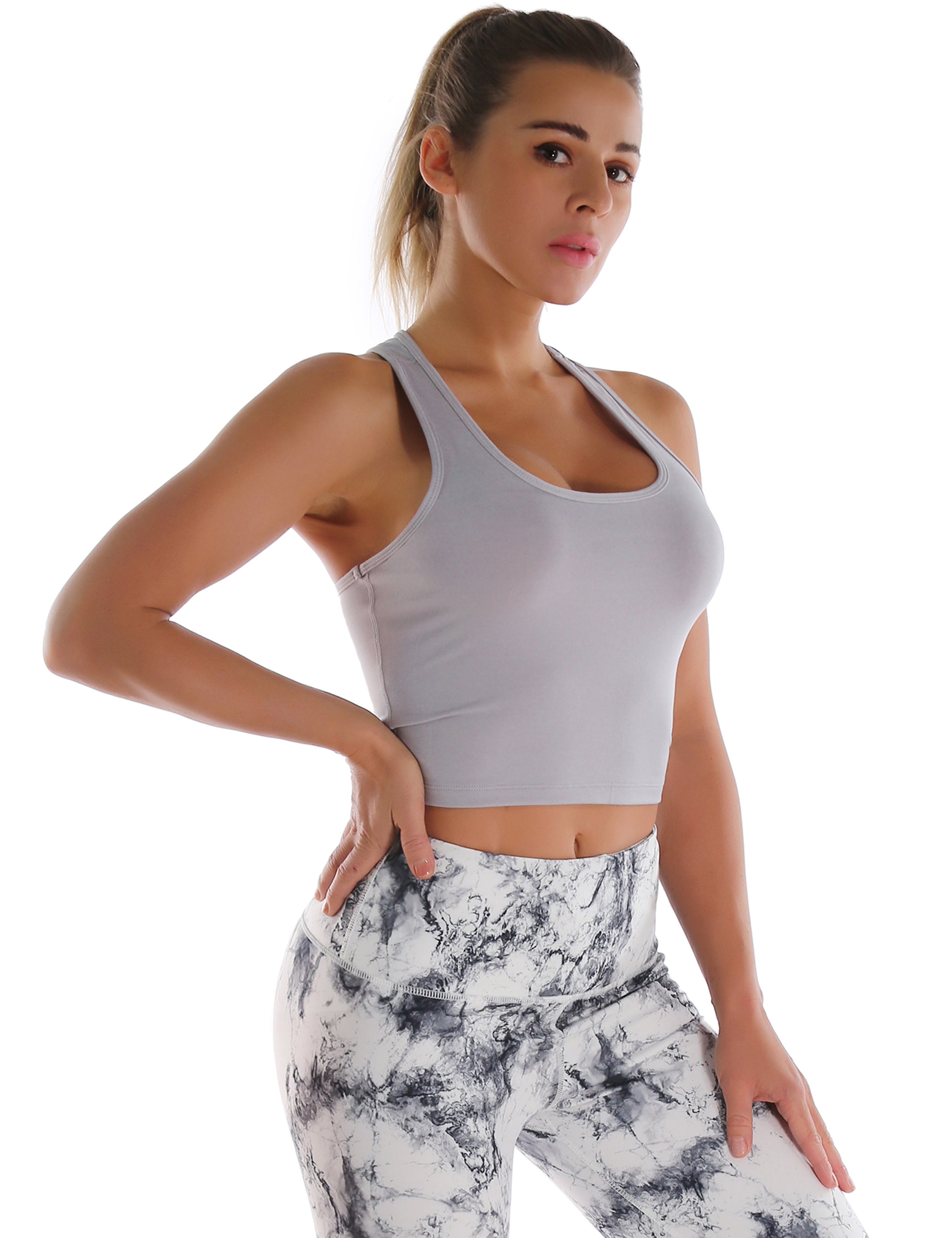 Racerback Athletic Crop Tank Tops heathergray 92%Nylon/8%Spandex(Cotton Soft) Designed for Yoga Tight Fit So buttery soft, it feels weightless Sweat-wicking Four-way stretch Breathable Contours your body Sits below the waistband for moderate, everyday coverage