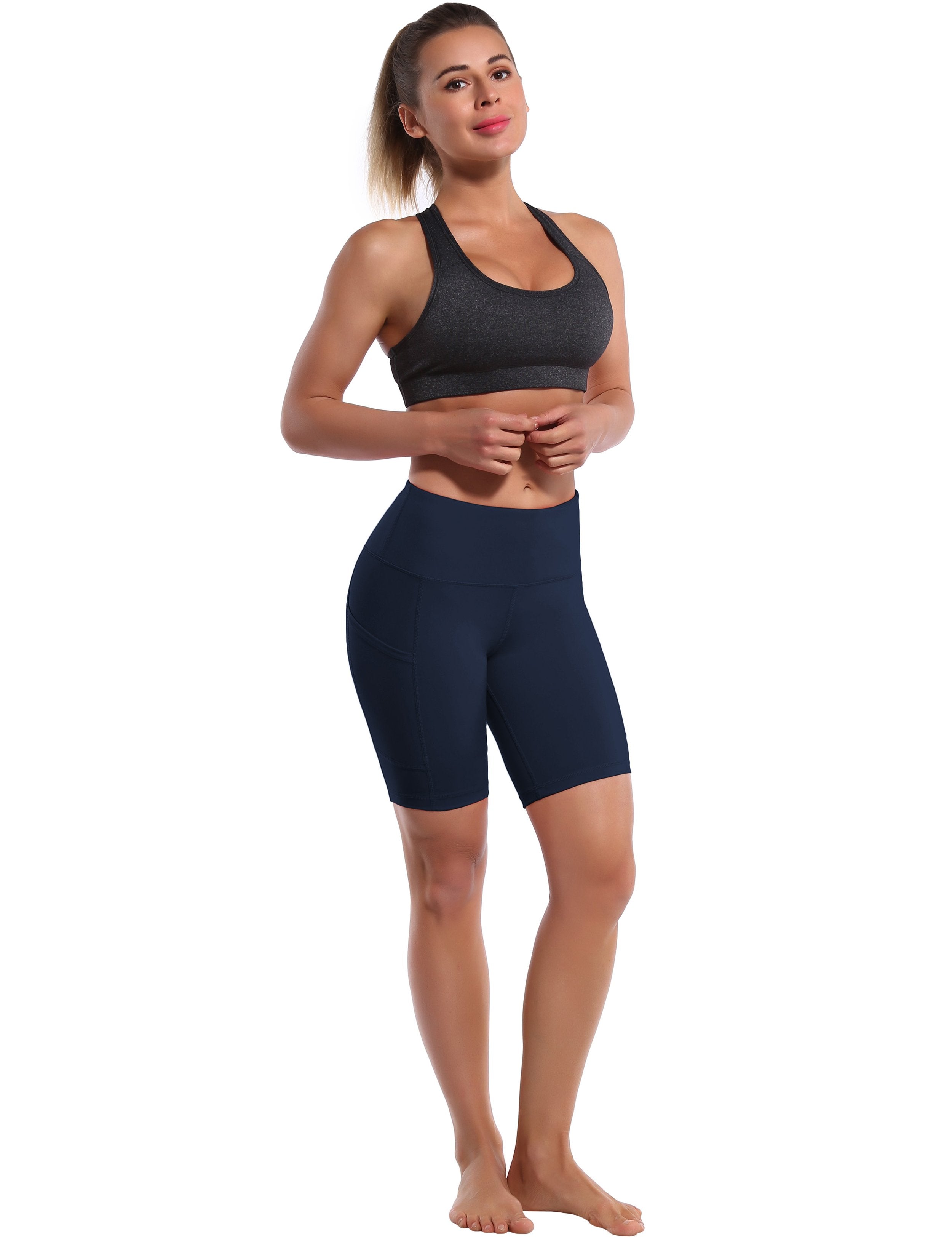 8" Side Pockets yogastudio Shorts darknavy Sleek, soft, smooth and totally comfortable: our newest style is here. Softest-ever fabric High elasticity High density 4-way stretch Fabric doesn't attract lint easily No see-through Moisture-wicking Machine wash 75% Nylon, 25% Spandex